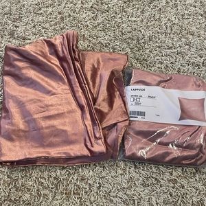 Two pink pillowcases